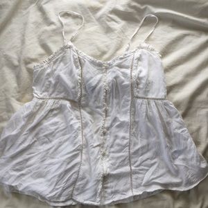 White flowy lace-trimmed tank